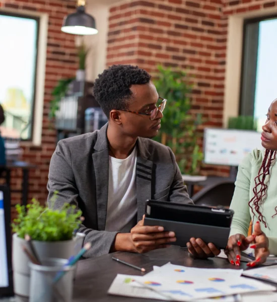 black-colleagues-reviewing-business-plan